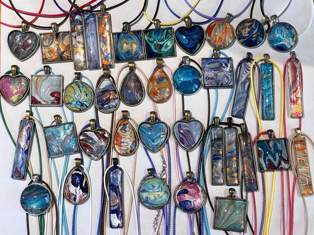 Necklaces made from the dried drippings from paintings.